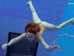 MomsCult presents: Curly hair redhead swims and looks sexy