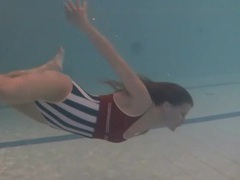 MomsCult presents: Leggy girl swims and strips naked in pool