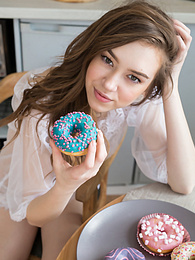 MomsCult presents: If you are a fan of skinny girls, check out how this cute little doll poses and teases totally naked in the kitchen.