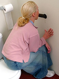 MomsCult presents: Blonde girl Jamie sits on the toilet and blows a black gloryhole dong
